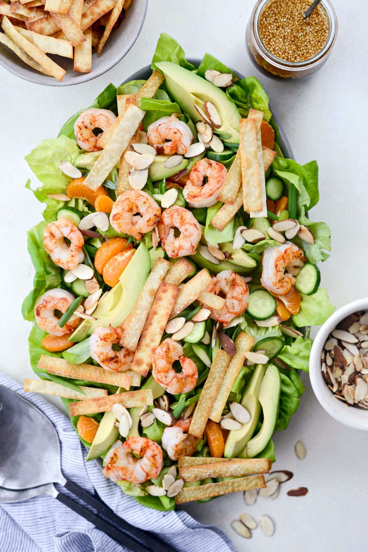 Grilled Asian Shrimp Salad with Crispy Wontons on platter.