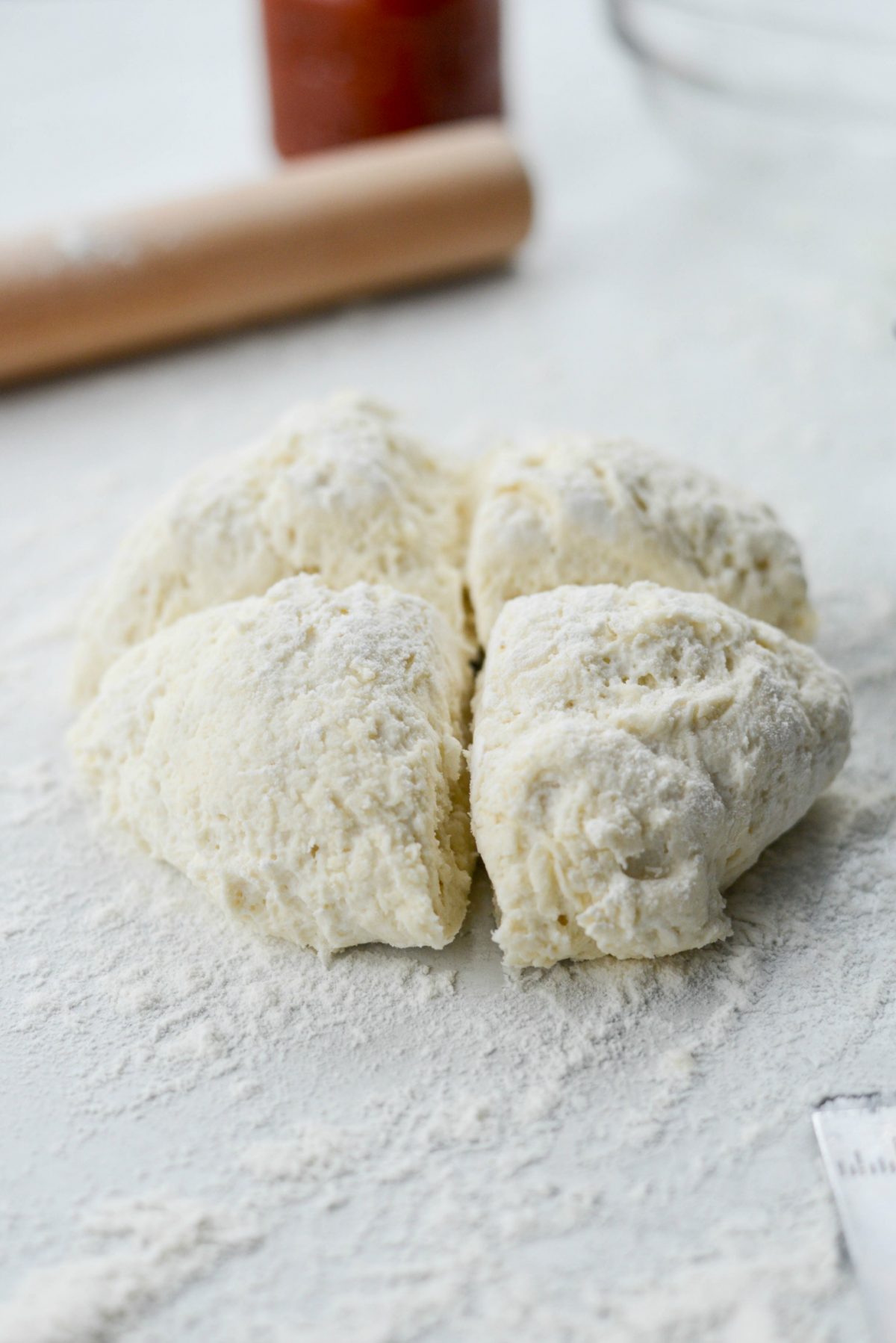 4 pieces of pizza dough