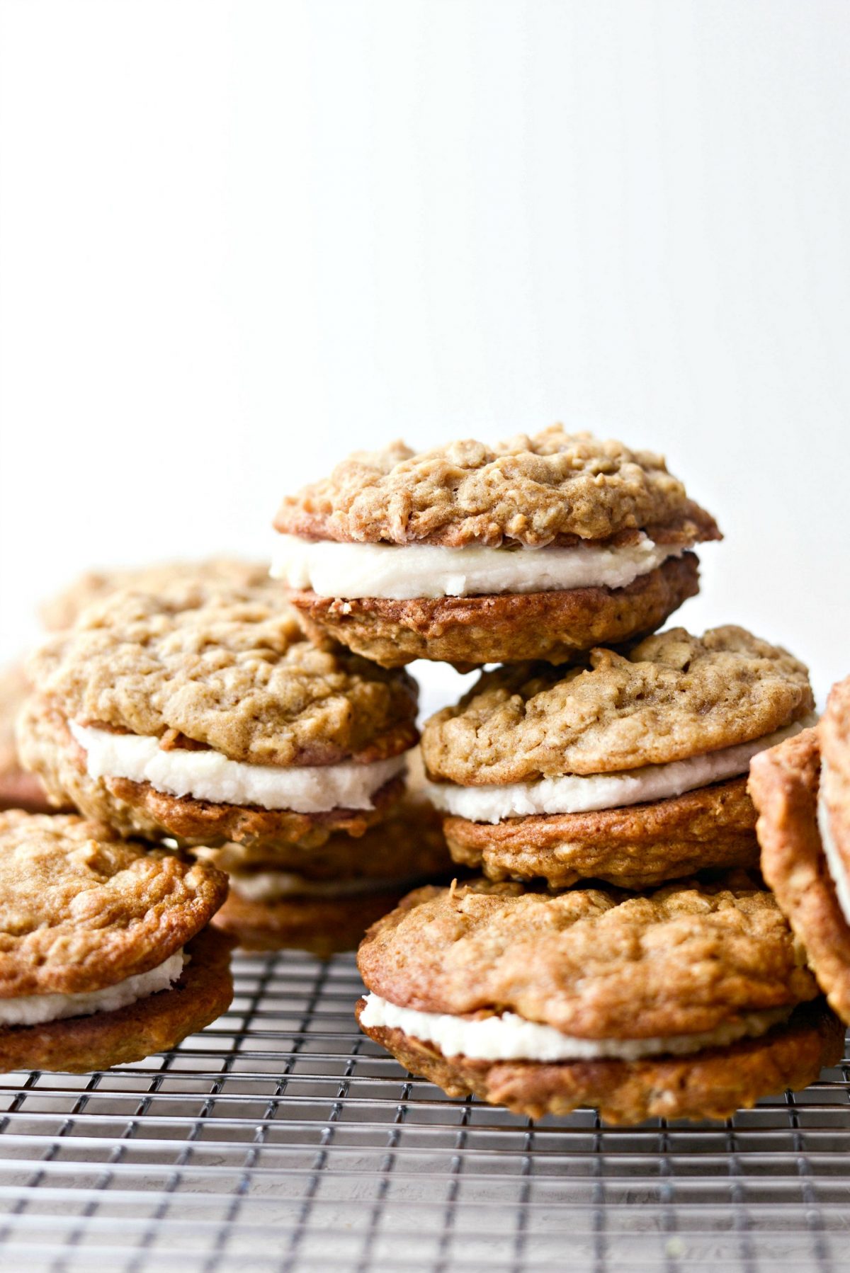 Homemade Oatmeal Cream Pies on baking rack.