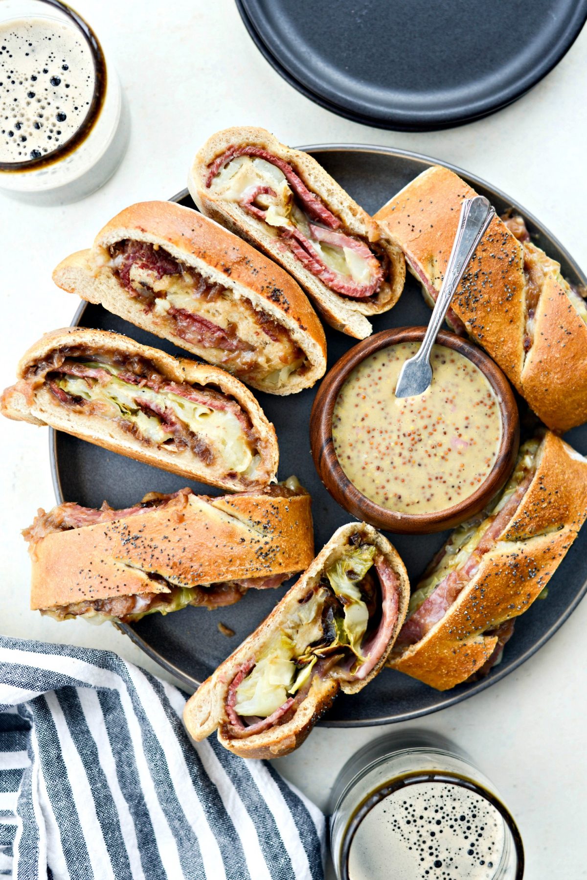 Corned Beef and Cabbage Stromboli with Guinness Mustard on platter