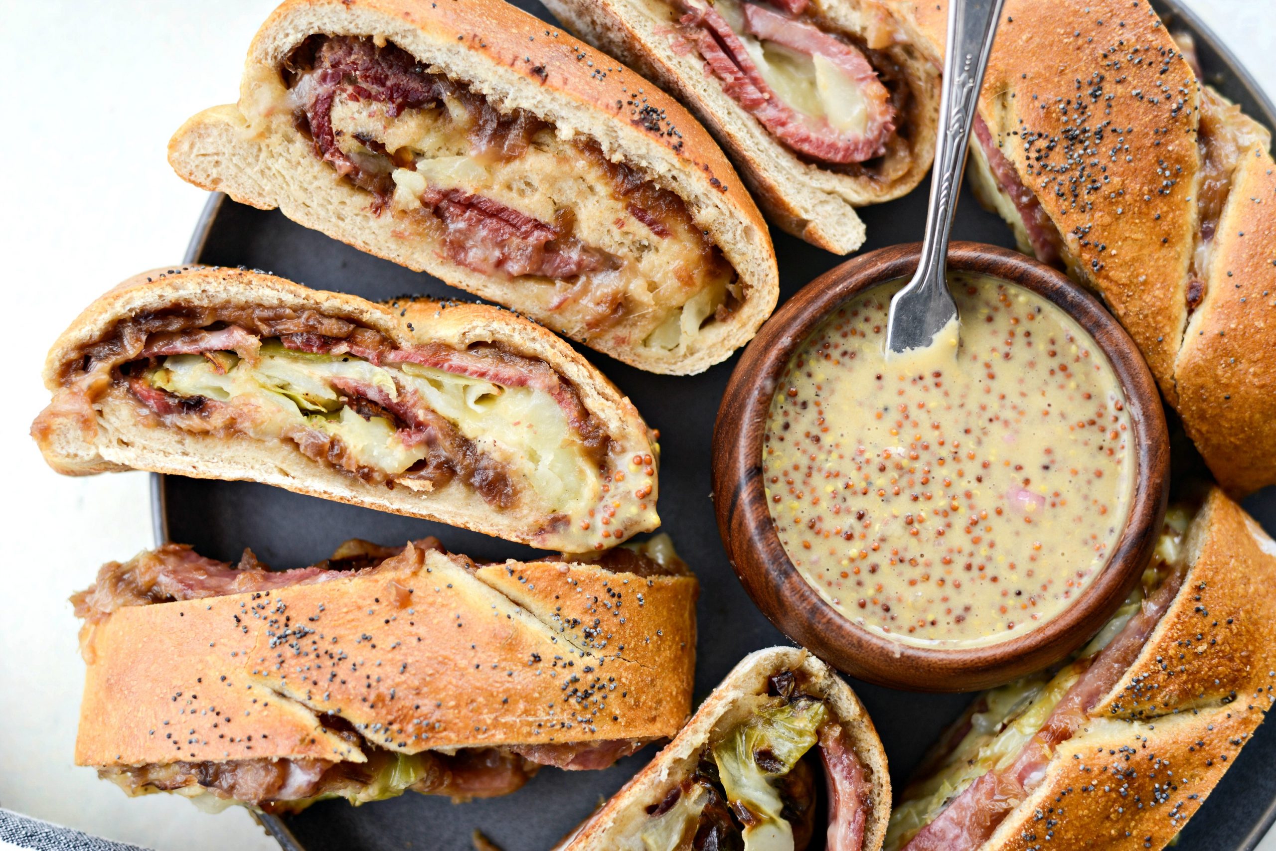 image of Corned Beef and Cabbage Stromboli With Guinness Mustard recipe by Simply Scratch