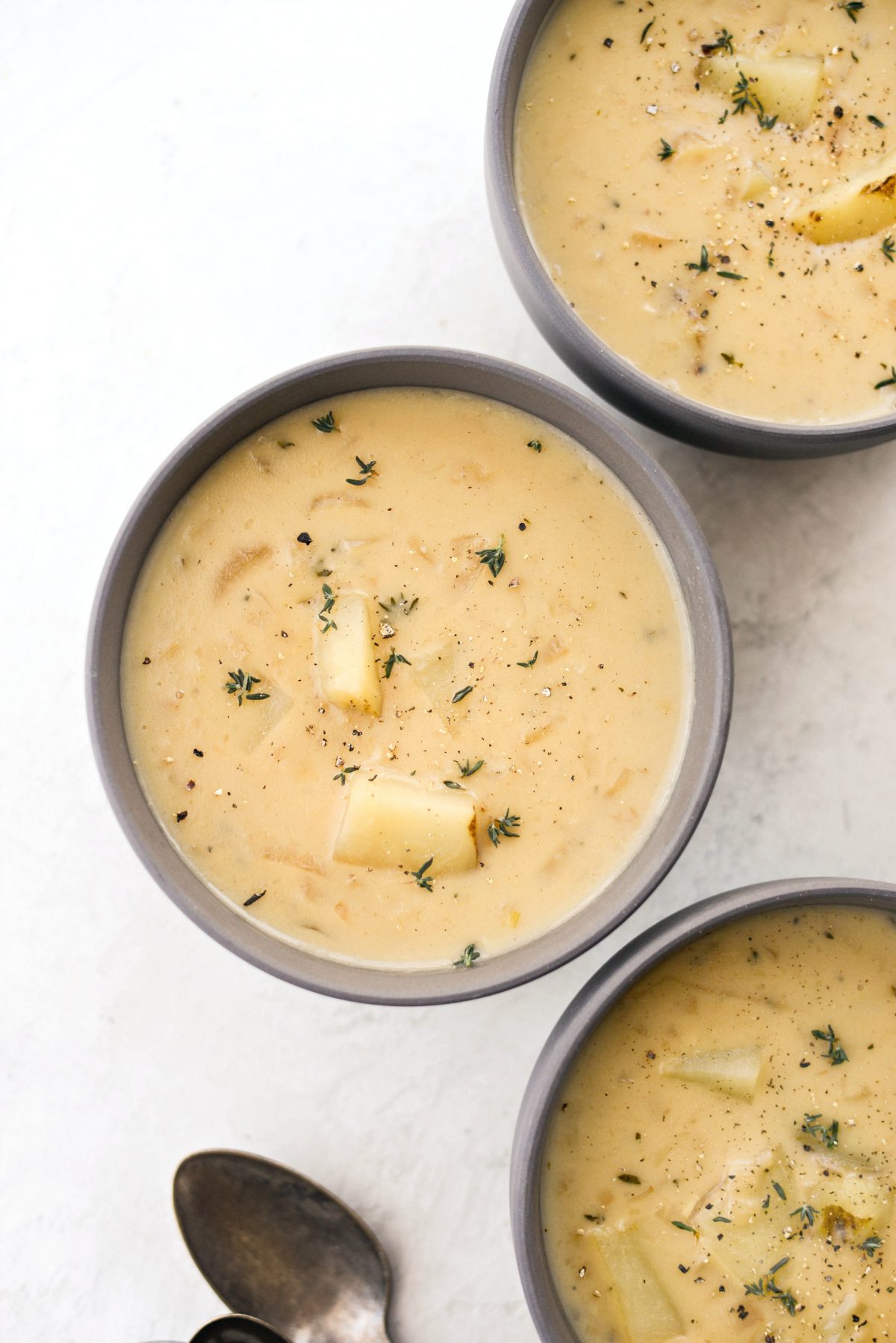 French Onion Chowder with fresh thyme leaves