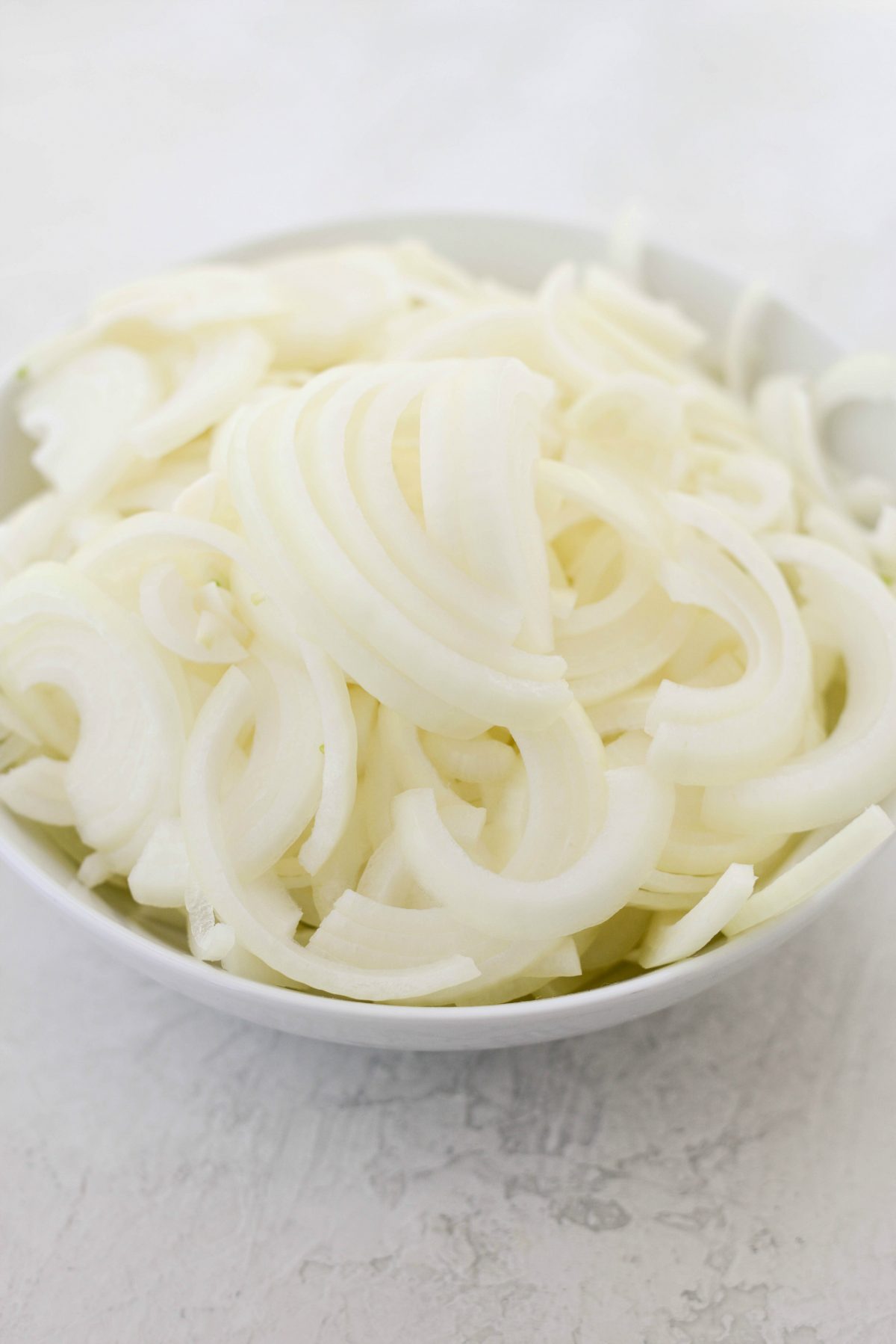 bowl of sliced onions