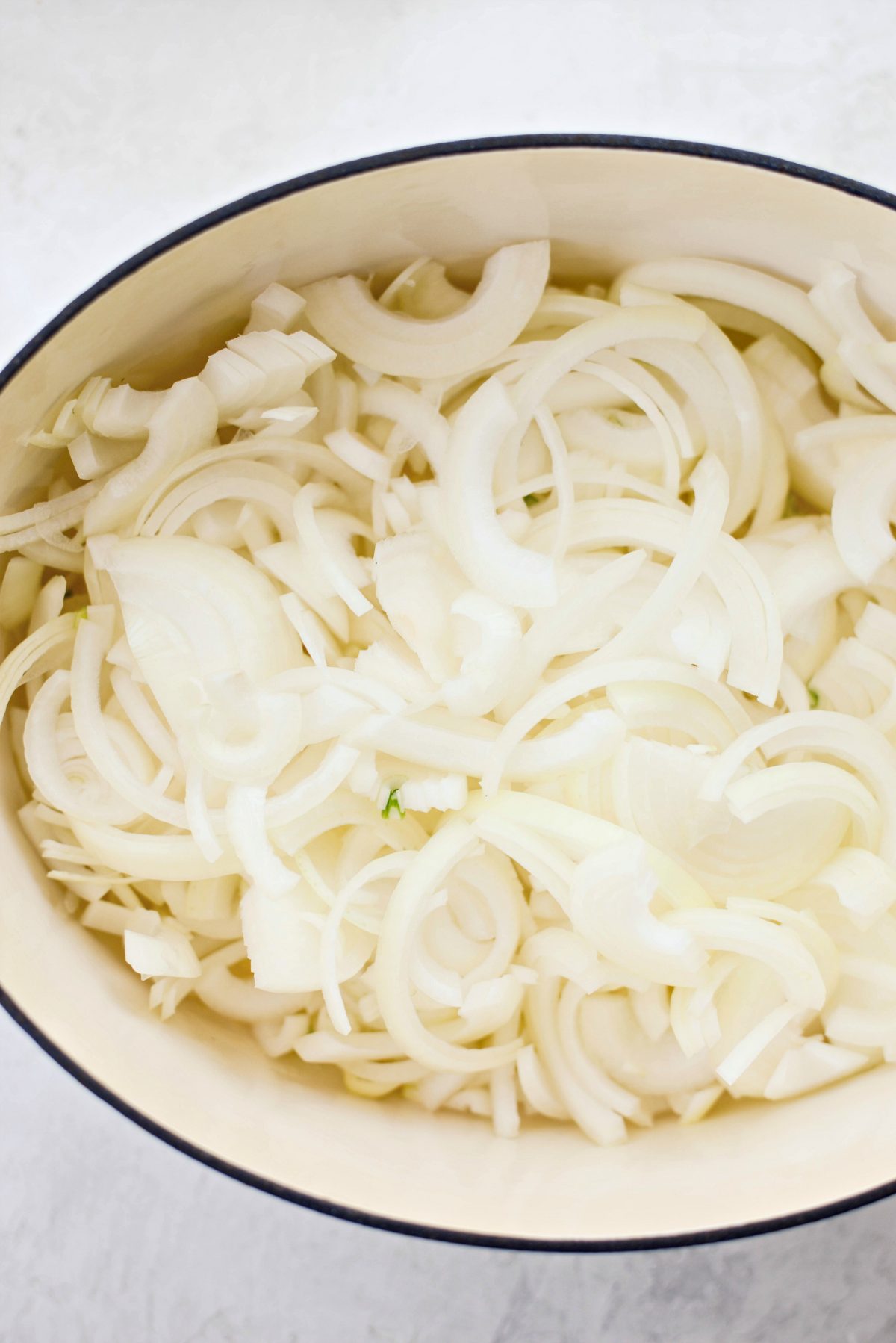add sliced onions to butter