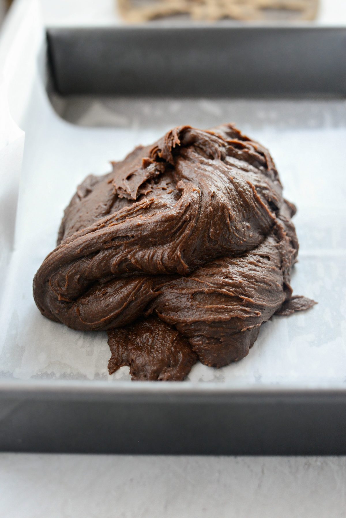 brownie batter in prepared pan.