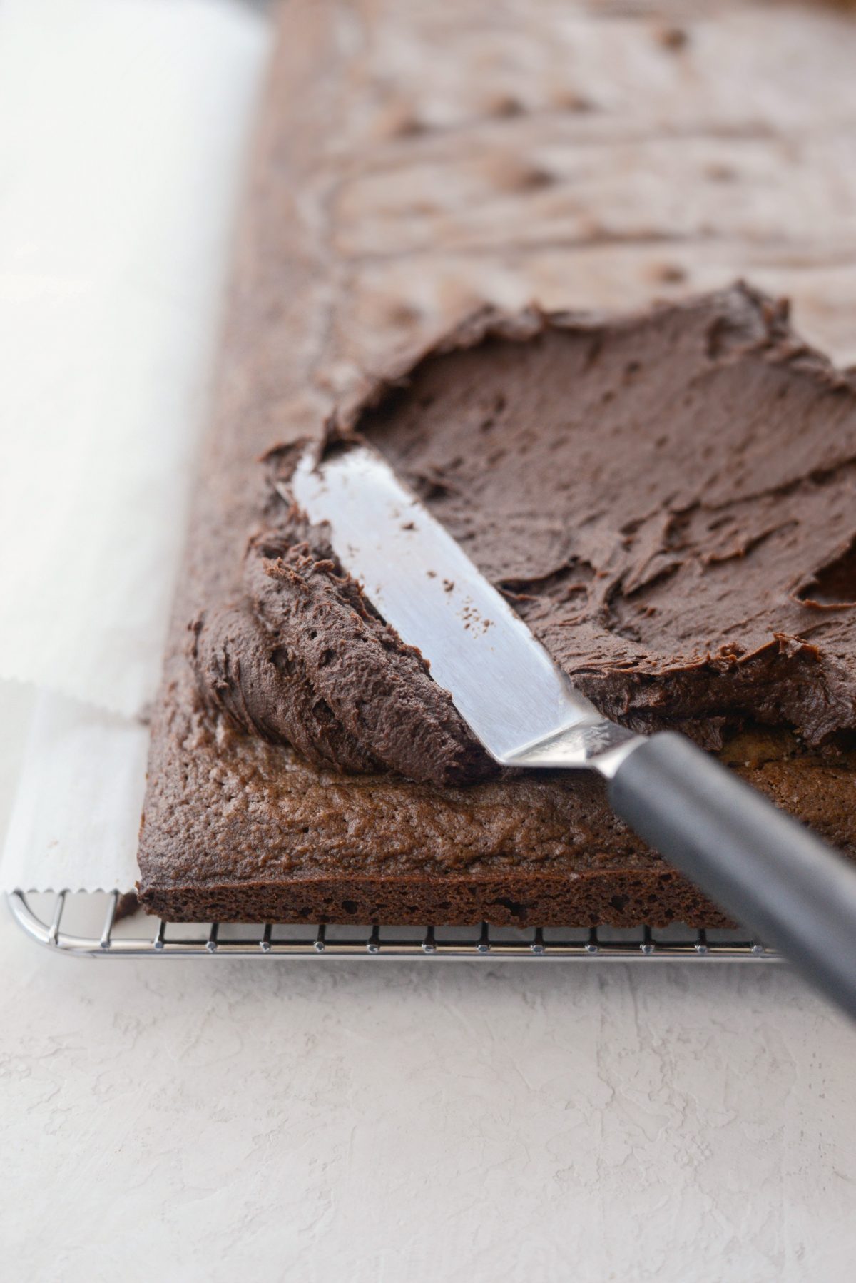 close up of frosting on brownie