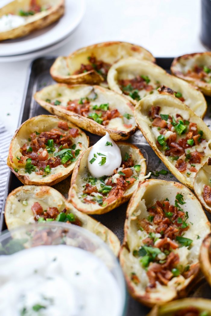 Irish Cheddar Bacon Jalapeño Potato Skins with sour cream and chives
