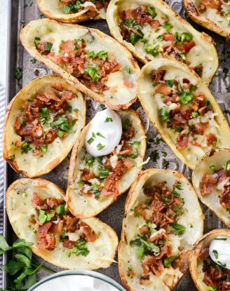 Irish Cheddar Bacon Jalapeño Potato Skins l SimplyScratch.com #stpatricksday #irish #bacon #jalapeno #irishcheddar #potato #potatoskins #snack #appetizer #party