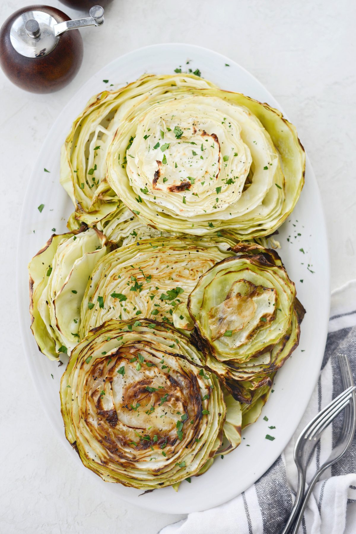 Roasted Cabbage Steaks on white platter