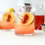 Whiskey Sour Sunrise l SimplyScratch.com #whiskey #lemon #cherry #adultbeverage #whiskeysour #recipe #drink #beverage