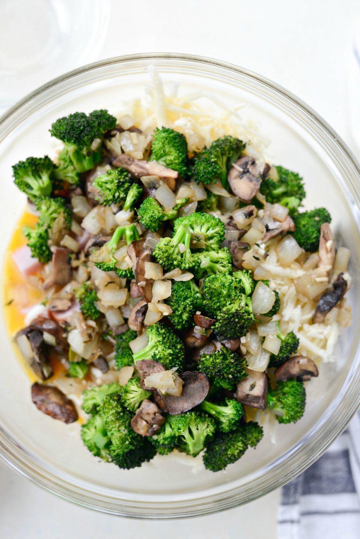 next add in the sautéed broccoli, onions and mushrooms.