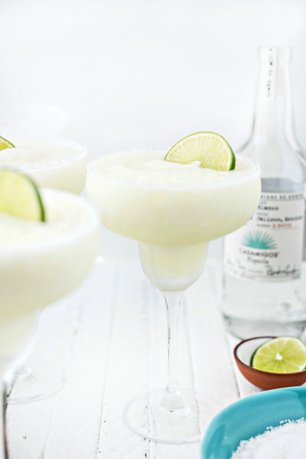 Frozen Margarita Slush with lime slice.