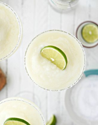 Frozen Margarita Slush l SimplyScratch.com #adultbeverage #margarita #frozen #tequila #cincodemayo #easy #blender #margs #drink