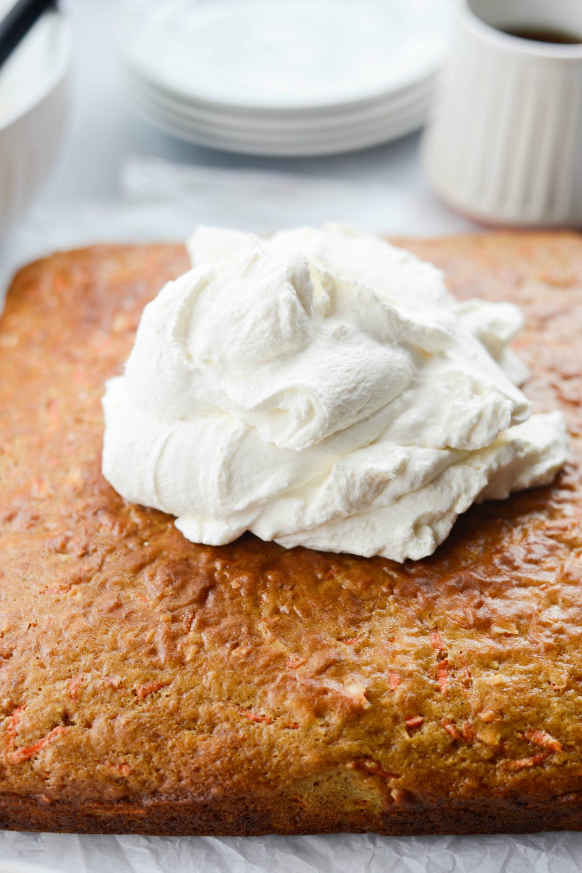 Add frosting to top of cooled cake.