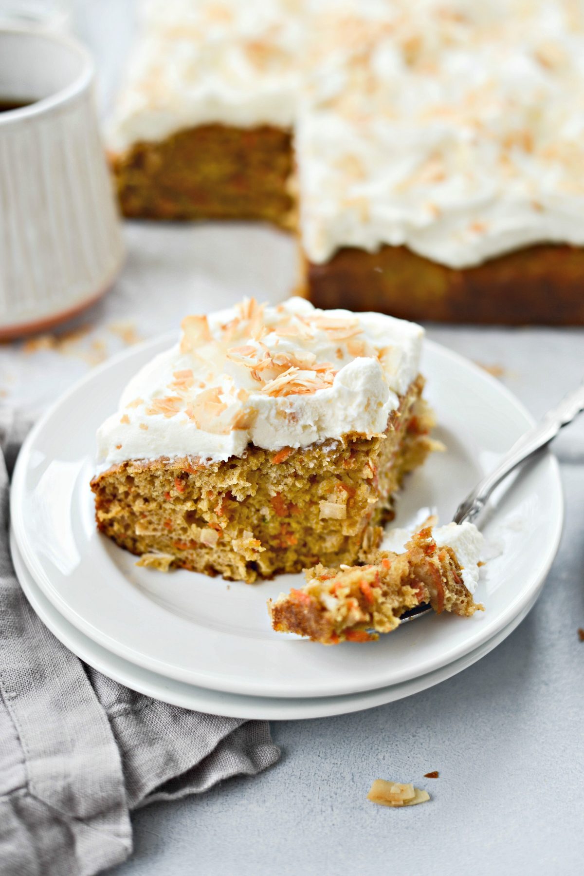 Toasted Coconut Chai Carrot Cake with Mascarpone Frosting l SimplyScratch.com #coconut #carrot #cake #chai #easter #carrotcake #mascarpone #frosting