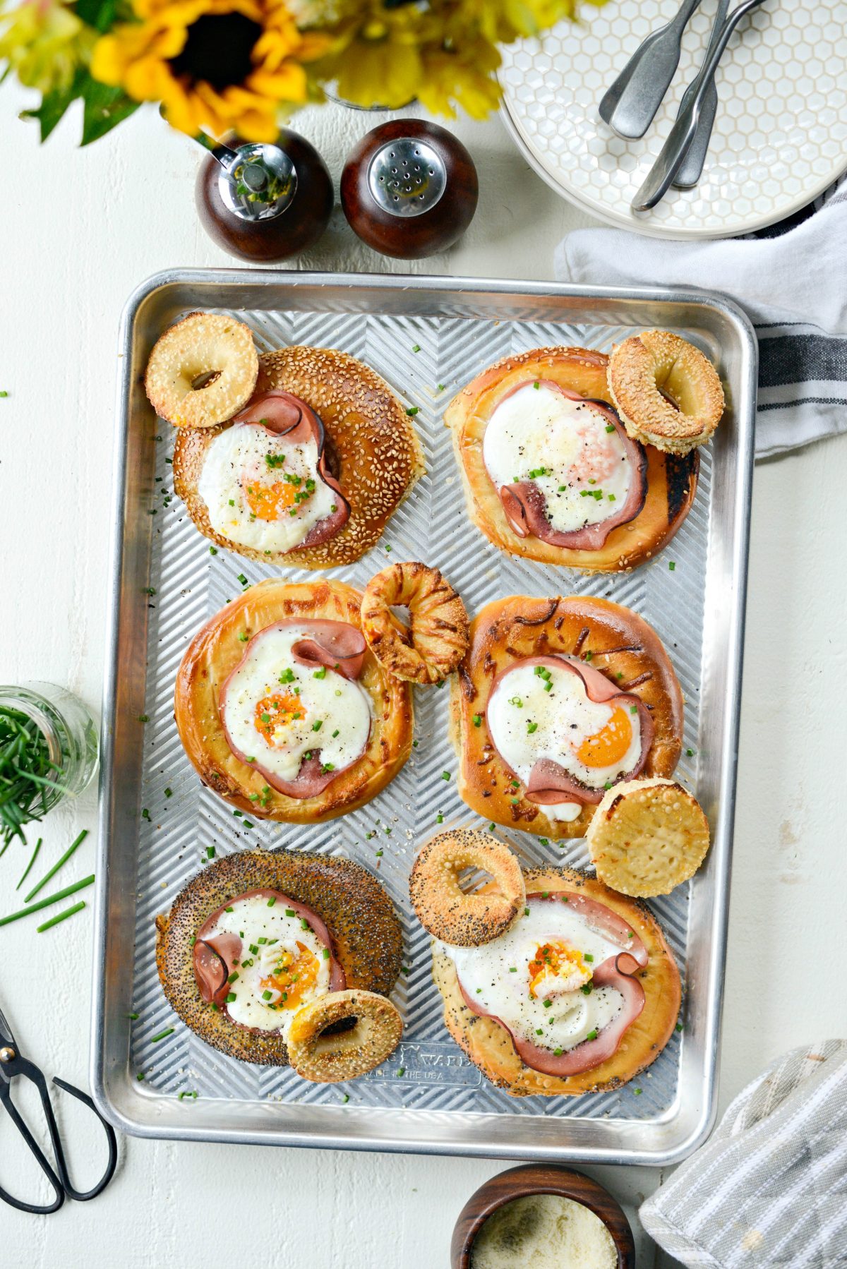 Baked Egg in a Hole Bagels l SimplyScratch.com #bagels #eggs #ham #sheetpan #mothersday #breakfast #easy #recipe