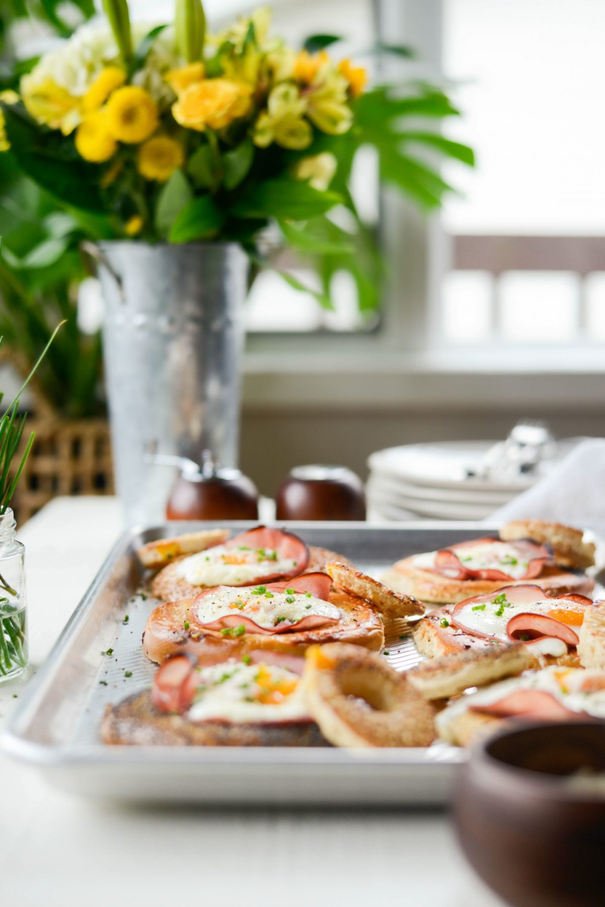 Baked Egg in a Hole Bagels l SimplyScratch.com #bagels #eggs #ham #sheetpan #mothersday #breakfast #easy #recipe