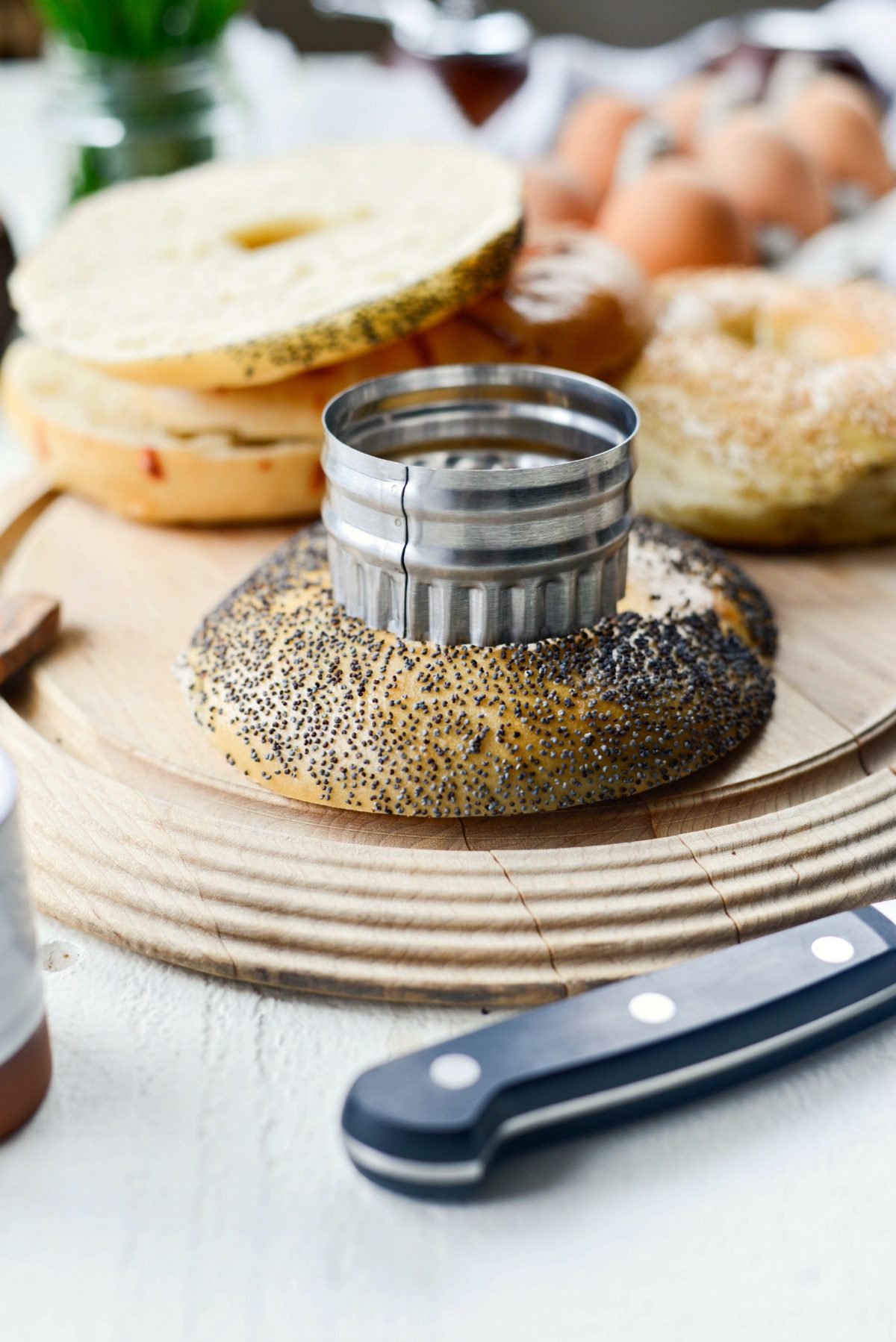 use a biscuit cutter to cut a larger hole out of the center.