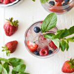 Red, White and Blue Sangria l SimplyScratch.com #adultbeverage #sangria #whitesangria #berries #wine #whitewine