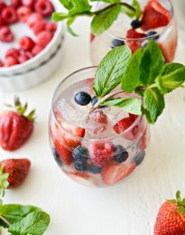 Red, White and Blue Sangria l SimplyScratch.com #adultbeverage #sangria #whitesangria #berries #wine #whitewine