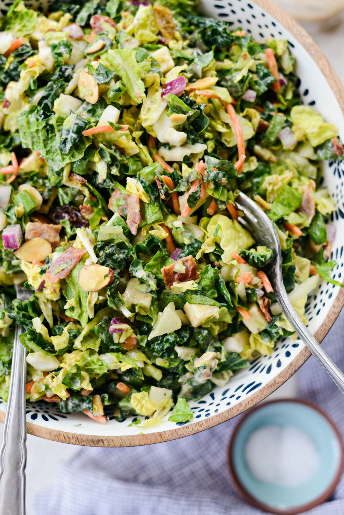 BBBQ Ranch Chopped Salad in a white and blue speckled wooden bowl.