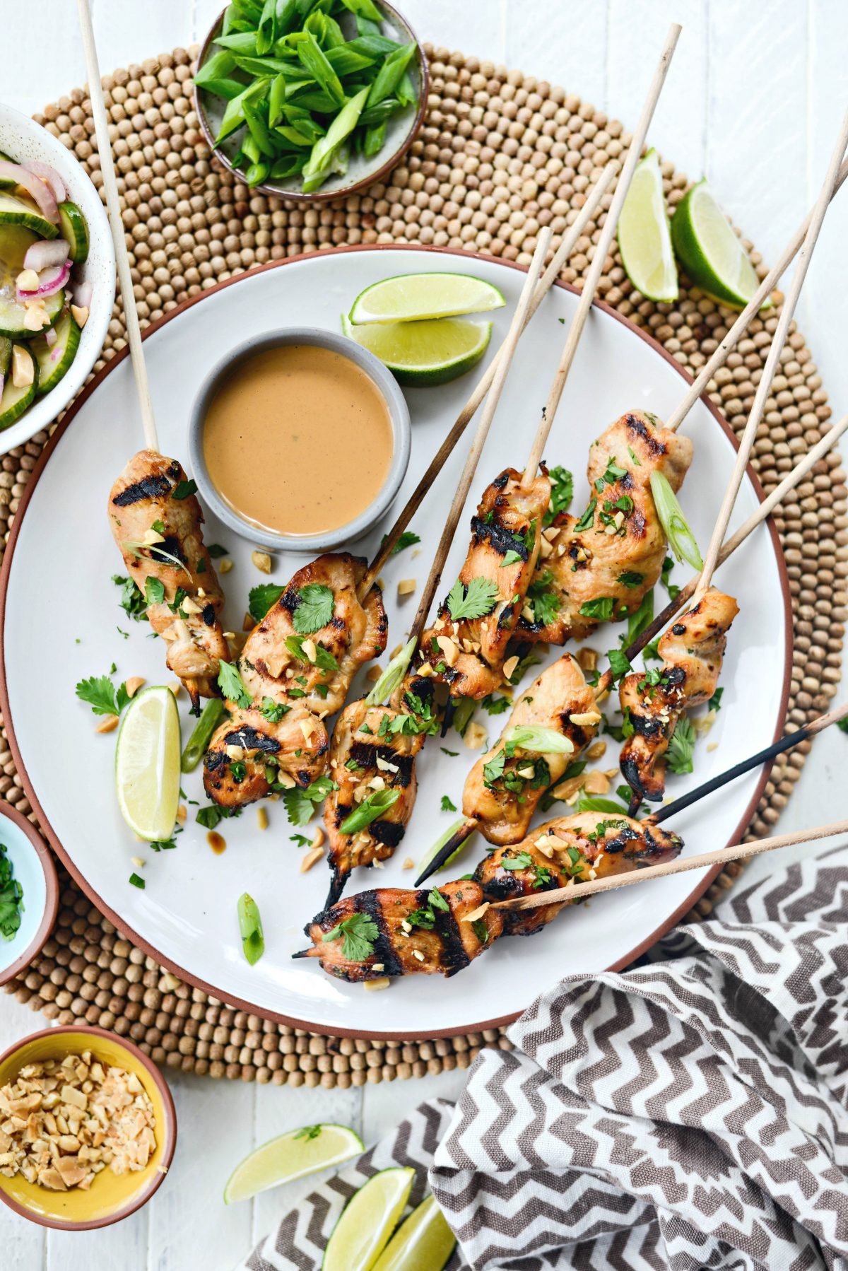 Chicken Satay with Thai Peanut Sauce on white platter