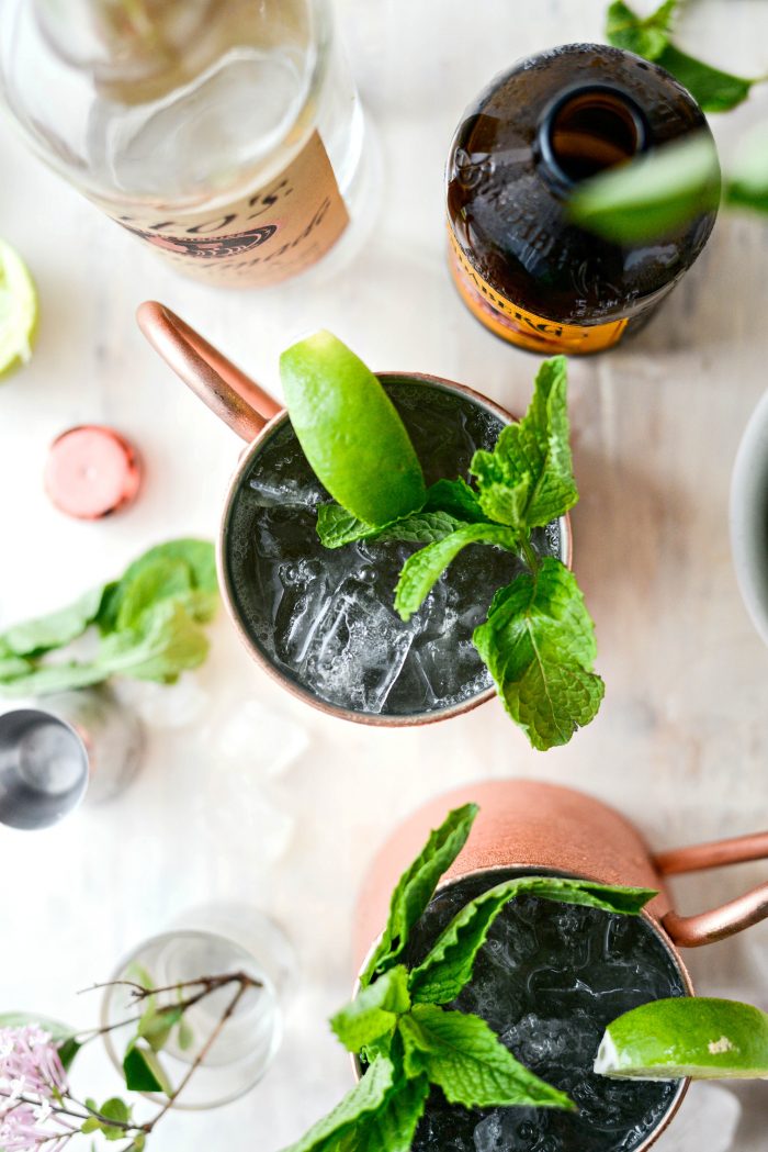 garnish with a sprig of mint and wedge of lime.