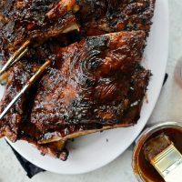 Easy BBQ Baby Back Ribs l SimplyScratch.com #easyrecipe #griling #BBQ #babybackribs #ribs #ovenbaked #grilled #homemade #sauce