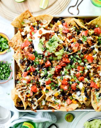 Deep Dish Black Bean Chicken Chorizo Nachos l SimplyScratch.com #blackbean #chicken #chorizo #nachos #easy #gameday #recipe #simplyscratch