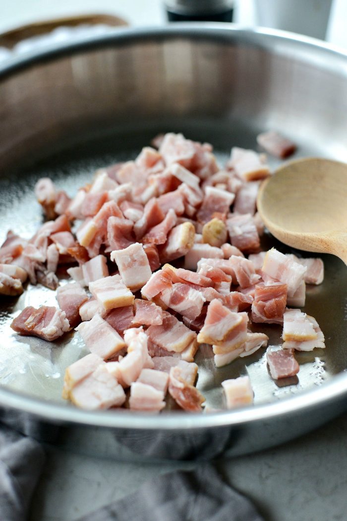 spray a skillet and add diced thick-cut bacon.