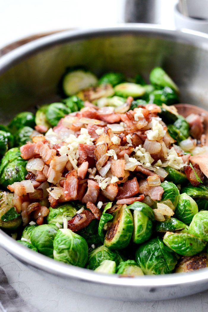 once tender add in the bacon and onion mixture plus minced garlic.