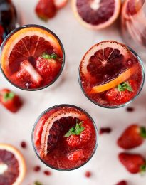 Champagne Sangria l SimplyScratch.com #champagne #sangria #valentinesday #adultbeverage #drink #alcholic #strawberry #pomegranate #raspberry
