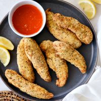 Air Fryer Lemon Pepper Chicken Tenders l SimplyScratch.com #homemade #airfryer #lemon #pepper #chicken #chickentenders #hothoneybutter