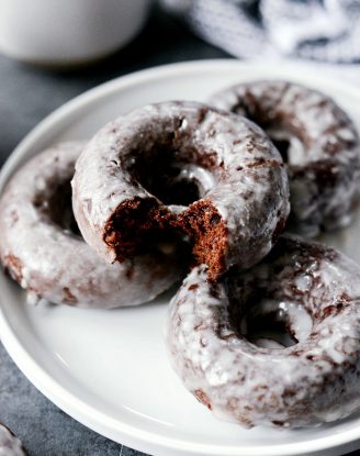 Glazed Chocolate Cake Doughnuts l SimplyScratch.com #glaze #chocolate #cake #doughnuts #baked #baking #easy #buttermilk