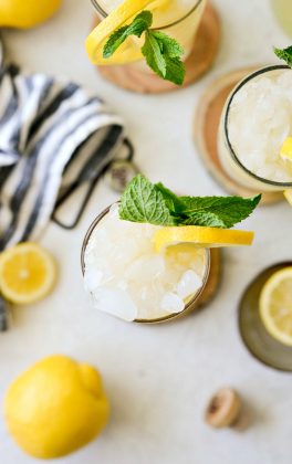 garnish lemon shandy refresher with lemon and mint