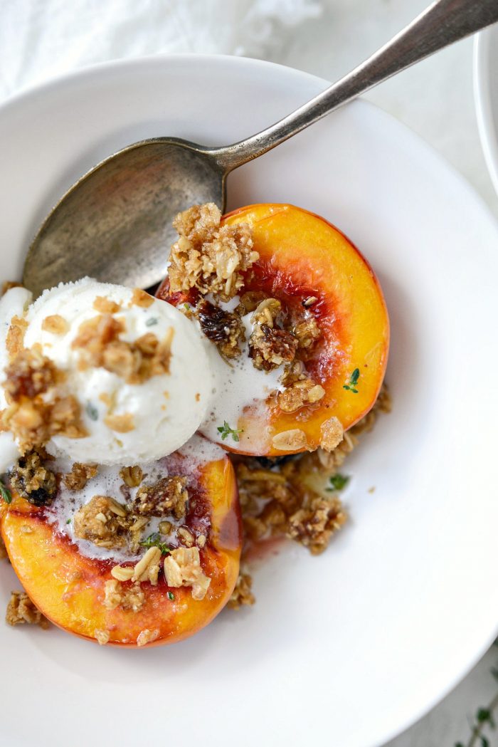 close up of Baked Nectarines with Oatmeal Cookie Crumble and vanilla ice cream 