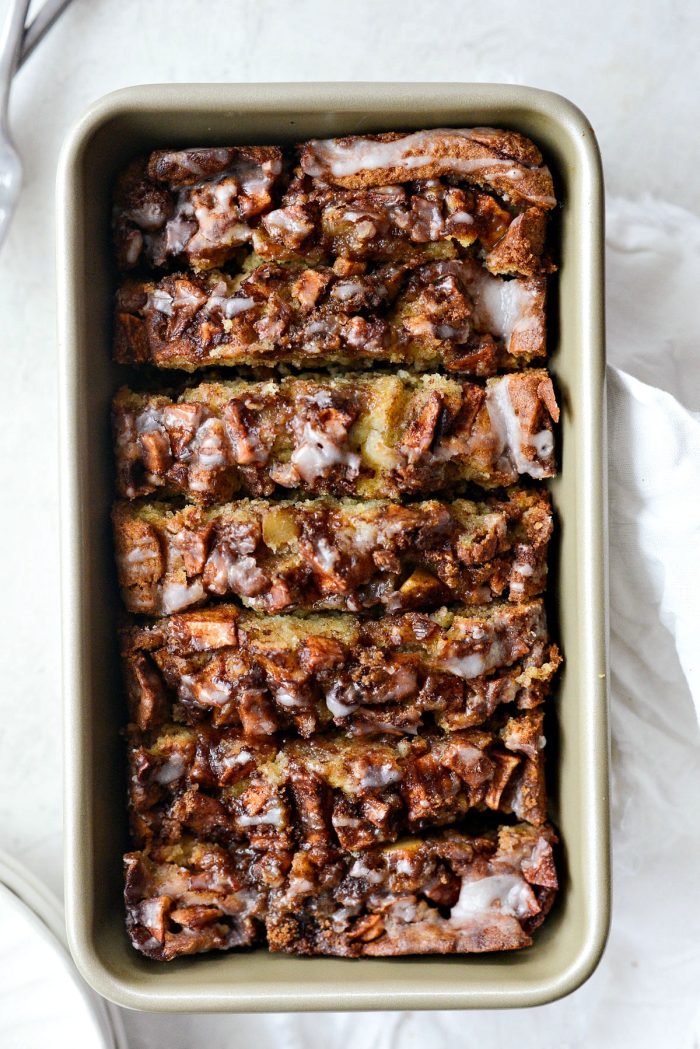 sliced dutch apple fritter bread in gold pan