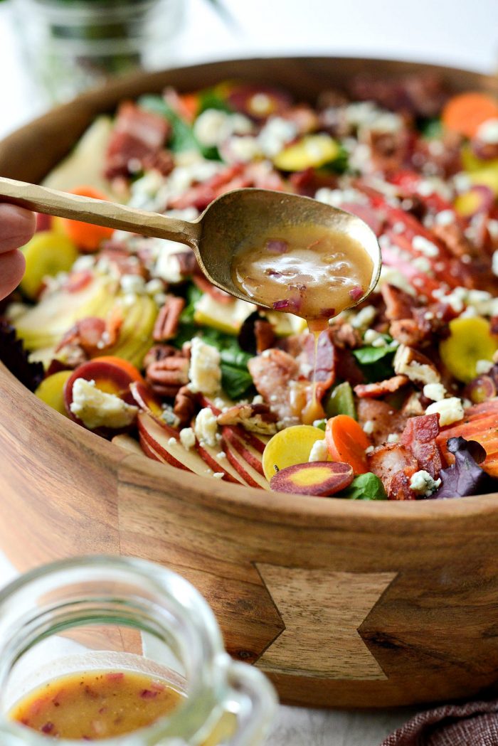 drizzling salad with dressing