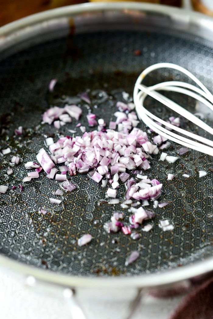 shallots added to bacon fat in skillet