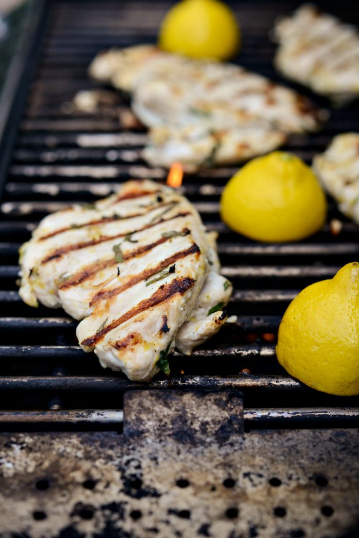 grilled lemon basil chicken on grill