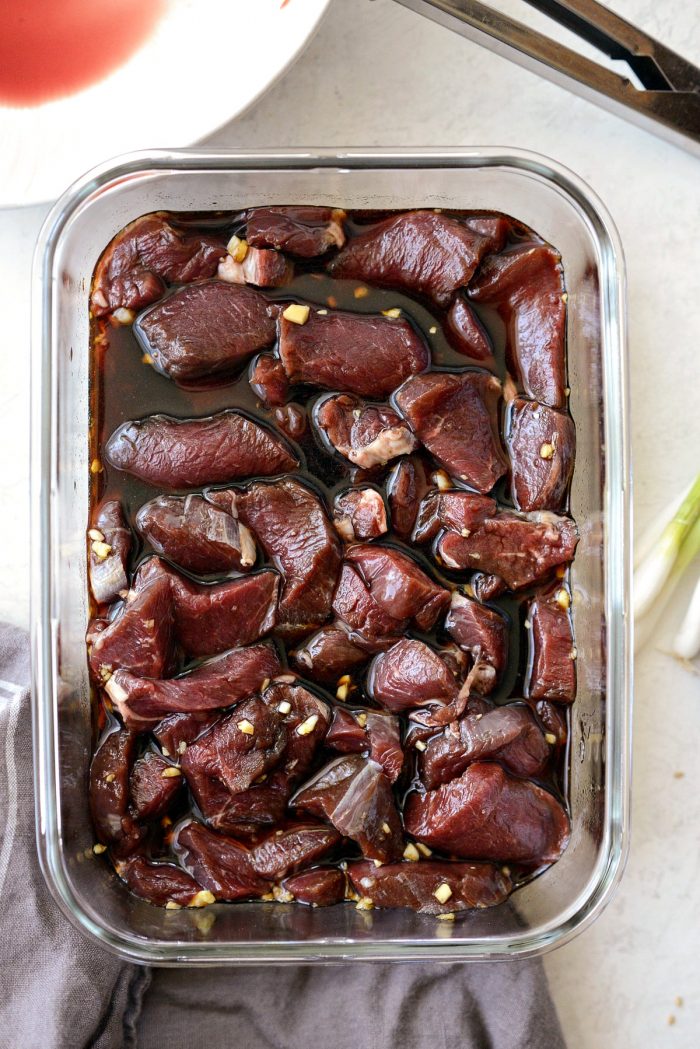 sliced venison backstrap in marinade