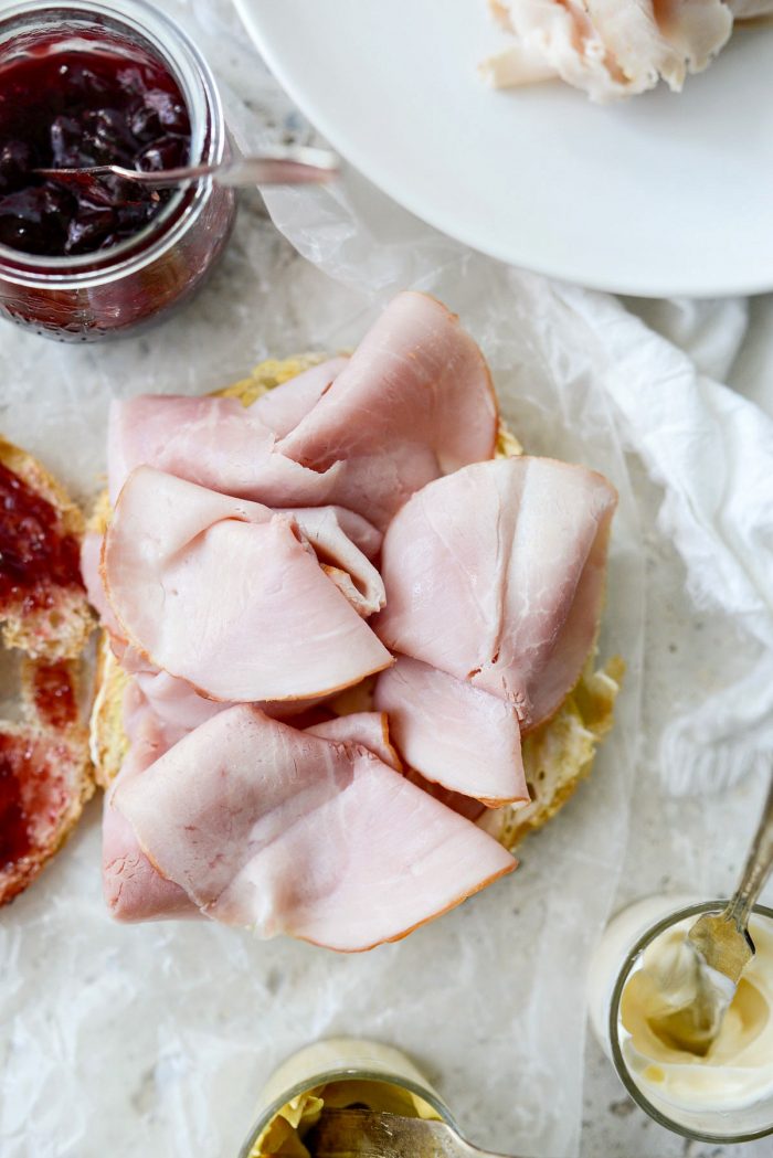 top the mustard half with ham