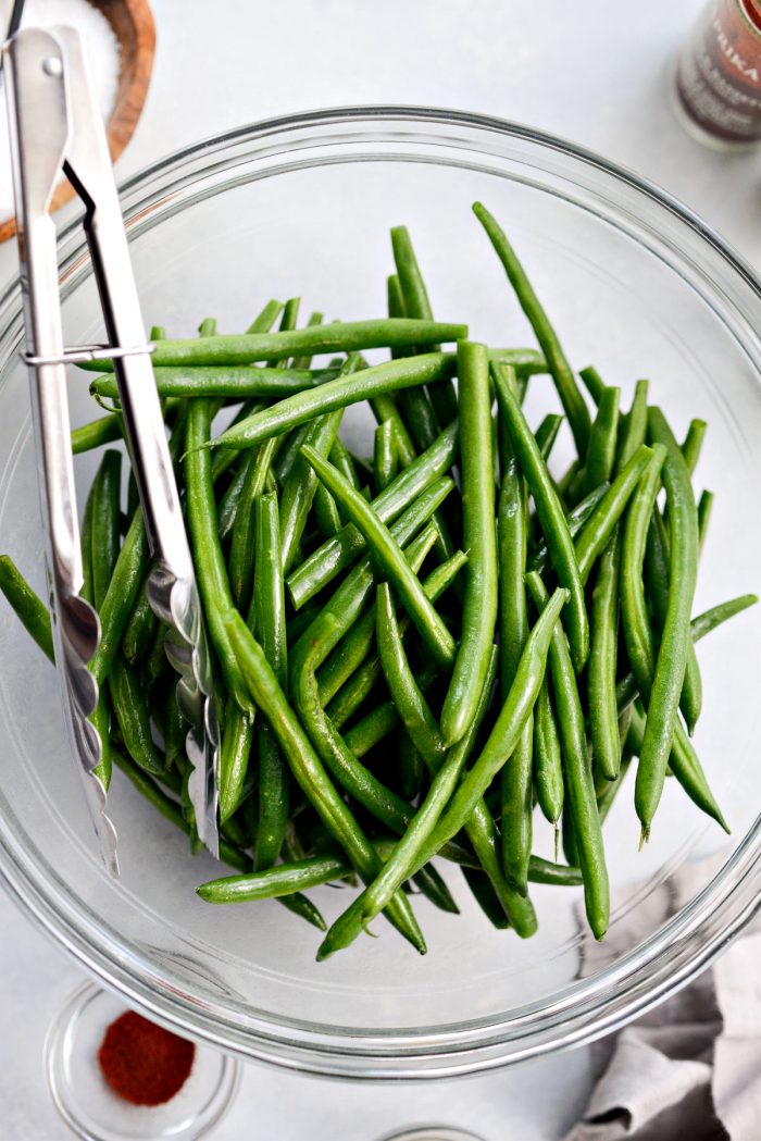 green beans sprayed with olive oil spray and tossed to coat