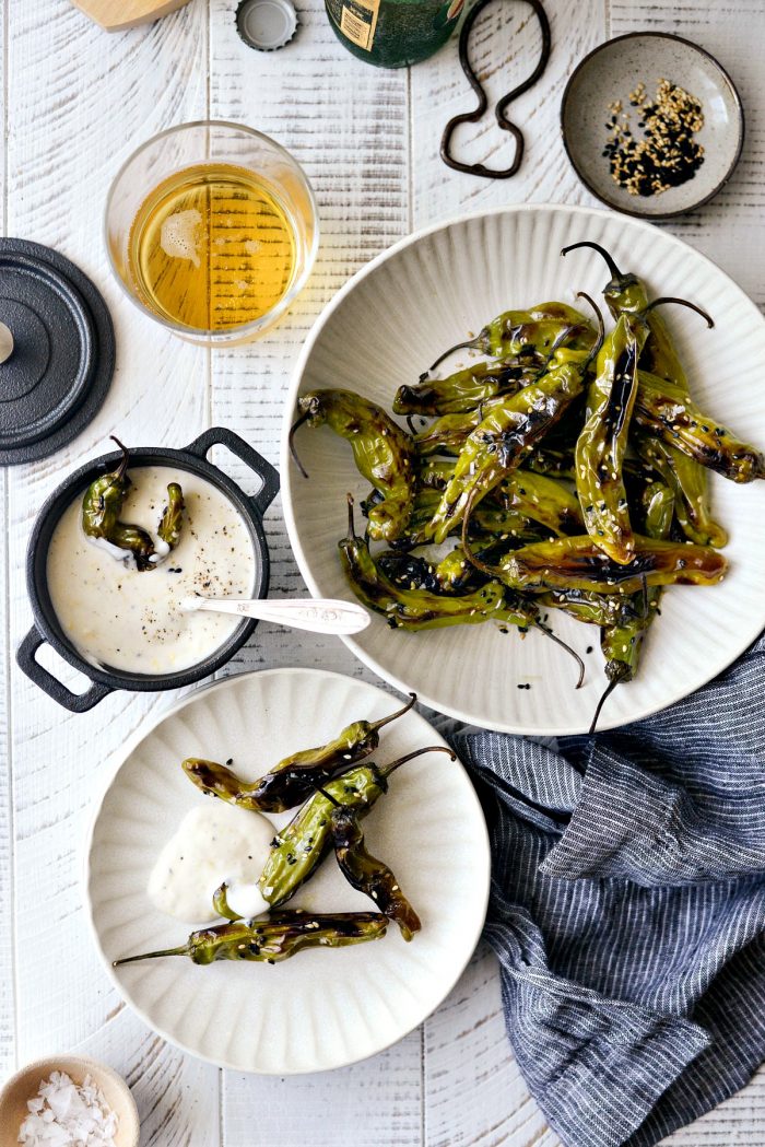 bowl of blistered shishito peppers and lemon garlic aioli