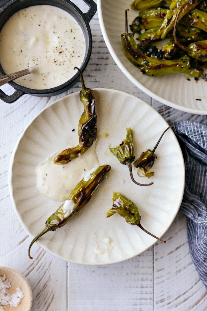 Plate with shishito peppers and aioli