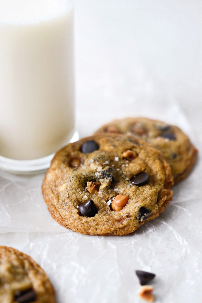 Salted Caramel Espresso Hazelnut Cookies by a glass of milk