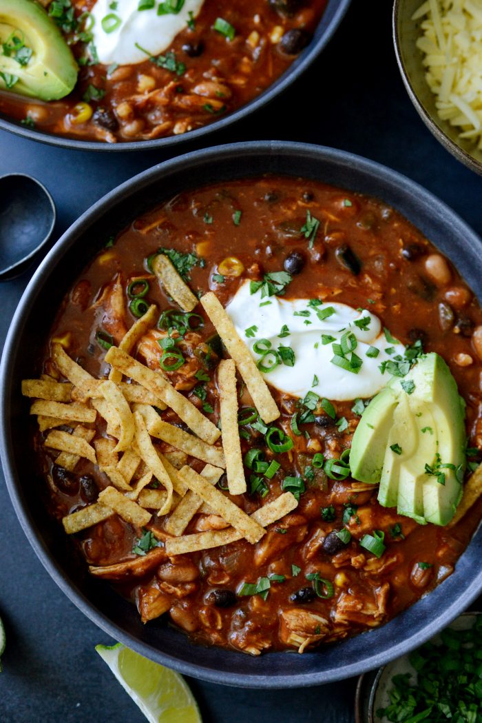 Southwest Chicken Chili with tortilla strips, avocado and cilantro.