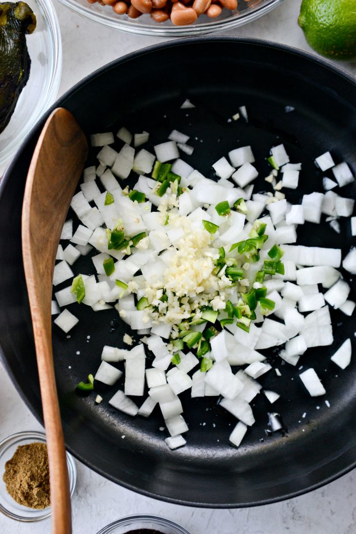 oil, onion, jalapeno and garlic with a pinch of kosher salt in a dutch oven