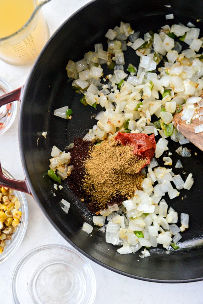 sauteed veggies with tomato paste, ancho chili powder and cumin.