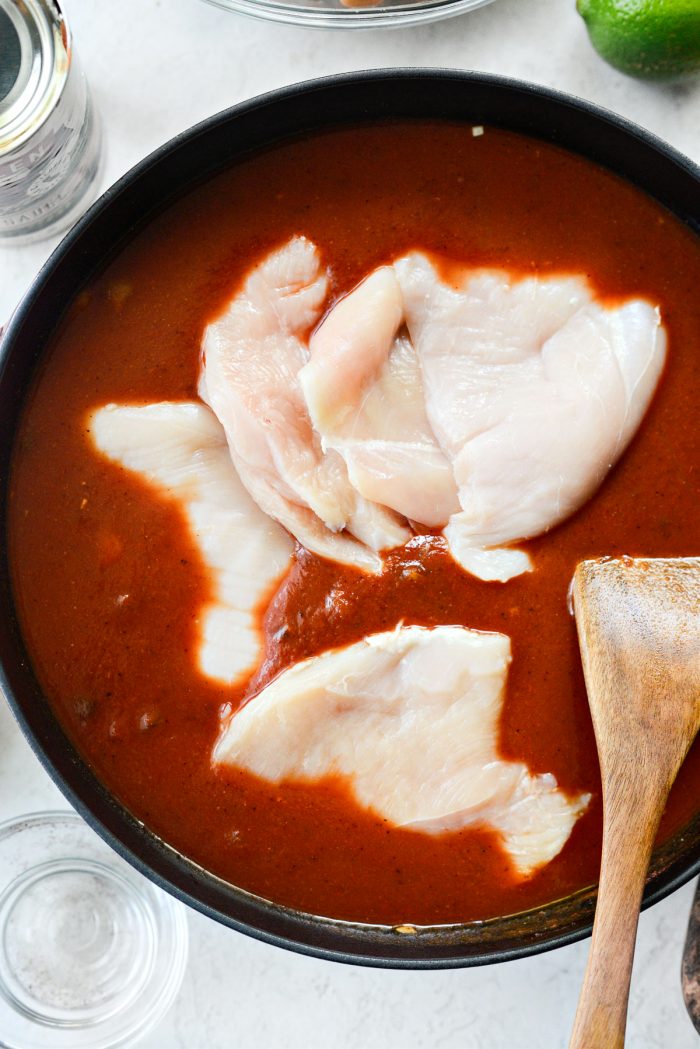 thin cut chicken breast added to pot